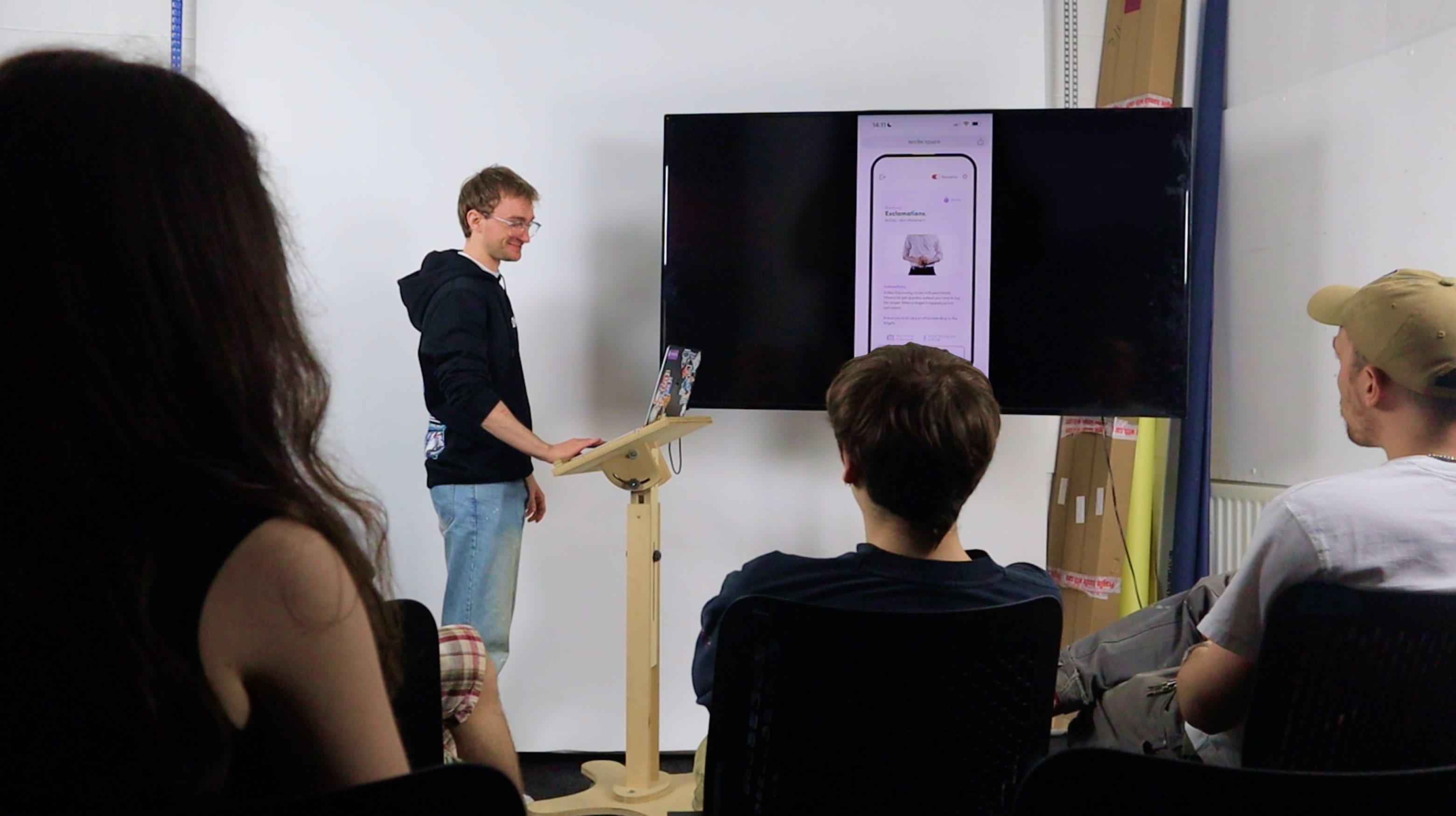 Thomas Kelly presenting the final interactive prototype to a focus group to get feedback and opinions on the design, interaction and functionality.